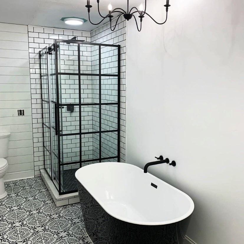 Bathtub and a Glass Shower Enclosure