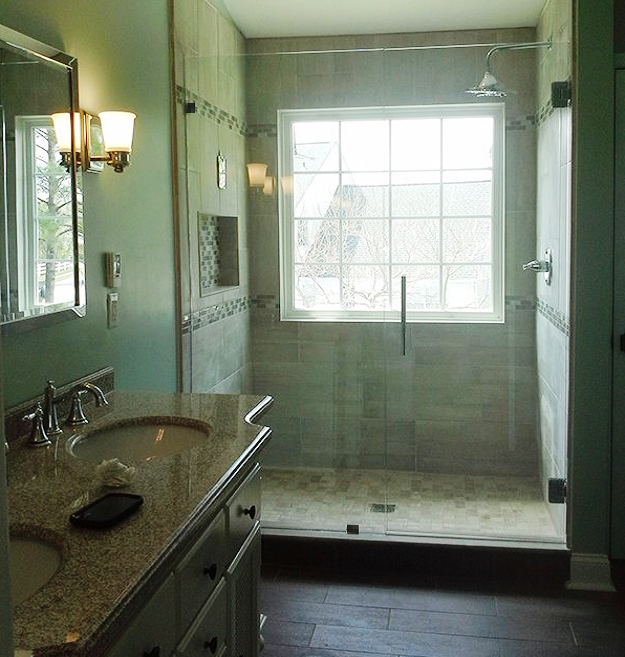 Glass, Hinged Shower Door in a Bathroom Renovation